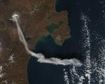 An image of the Sheveluch (Shiveluch) volcano in Kamchatka, Russian Federation emitting an ash plume taken by NASA’s Aqua satellite in 2012. Image: NASA Earth Observatory.