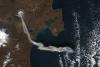An image of the Sheveluch (Shiveluch) volcano in Kamchatka, Russian Federation emitting an ash plume taken by NASA’s Aqua satellite in 2012. Image: NASA Earth Observatory.